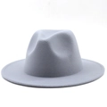 Detail of light grey wool fedora hat showing wide brim and classic indented crown top - Light Gray