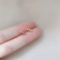 Minimalist 925 sterling silver stud earrings featuring three tiny connected stars design - Triple Stars / Silver