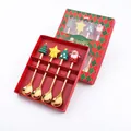 Christmas gift set with 4 golden stainless steel spoons featuring cartoon holiday figurines - Christmas Four-piece Bedding Set (2002 Design)