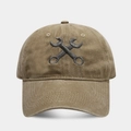 Macro detail of wrench embroidery on washed cotton fabric of the vintage baseball cap - Adjustable / Khaki