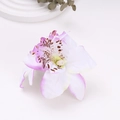 Detail of white artificial orchid hair clip with pink edges and leopard pattern core - Light Purple