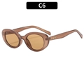 Retro oval sunglasses with translucent tea frame and gold star accents on the temples - Brown