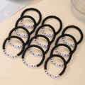Set of 12 black polymer clay bead bracelets with gold accents and BE KIND lettering - Black