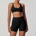 Set yoga nero due pezzi con pantaloncini a vita alta e reggiseno sportivo con scollo a U - Taglia S / Top E Pantaloni / Reggiseno + Pantaloncini / Nero premium