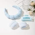 Detail of light blue spa headband set with plush wristbands and matte hair clip - Blue Headband Wristbands And Square Clip