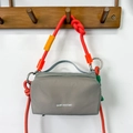 Grey waterproof crossbody hiking water bottle bag with bright orange rope strap - Light Gray
