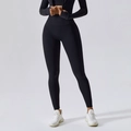 High-waisted black yoga leggings for women with sculpting fit and breathable fabric - Premium Black