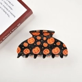 Halloween claw clip featuring orange pumpkin patterns on a black hair accessory - Pumpkin Claw-8.7cm