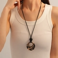 Retro acrylic leopard print geometric ring necklace for women styled on a white outfit - Khaki Leopard Circle Style