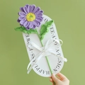 Handmade knitted purple African daisy flower bouquet with decorative white card and ribbon - Gerbera - Purple