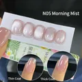 Cat eye gel polish in Morning Mist N05 with magnetic glitter effect on nails - N05 Morning Mist 7ml. Acceptable Translucent Cat's Eye Color. The Color Swatches Are All Applied In 2-3 Layers Under Uv Curing; Color Differences Are Inevitable.