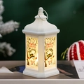 Macro detail of a white vintage Christmas LED lantern with snowman print and warm glow - White Snowman
