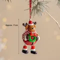 Christmas reindeer bell ornament with red scarf and hat hanging on a tree, 11cm height - Elk Bell