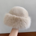 Plush faux fur bucket hat in beige featuring a thick warm fuzzy texture and dome style - Beige