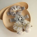 Detailed view of baby headband and socks set with lace bow and tulle pom-pom details - 4666 Grey Star Headband + Openwork Socks
