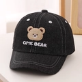 Detailed close-up of cute bear embroidery on a black denim baseball cap for kids - 52cm (2-5 Years) / Denim Black