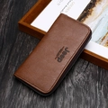 Brown leather long wallet for men with zipper closure and textured litchi grain finish - Tan
