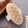 Handheld Brush With Soft Nodules