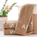Classical ARTIS camel cotton towel with orange stripes and plush terry texture - ART Style Khaki Towel