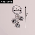Detail showing antique silver snowflake keychain with 3cm ring and 7.5cm length measurements - Silver Snowflake