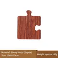 Puzzle-shaped ebony wood coaster with natural dark brown grain for tea cup heat insulation - Sapele Wood / Upgraded / Single