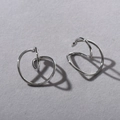 Close-up of minimalist silver geometric double-loop ear cuffs with sleek metallic finish - Silver Ear Clips (Pair)