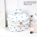 White quilted barrel makeup bag with blue bow prints, lace trim, and pearl zipper puller - White Bucket Style