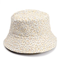 Detail shot of a double-sided sun hat featuring a vibrant green and yellow floral pattern - Beige Green Floral (08#)