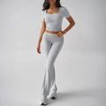 Set sportivo Y2K grigio da donna con crop top e pantaloni a zampa per uso casual - S / Grigio Melange