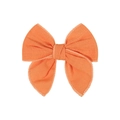 Detailed view of the orange fabric texture and fine stitching on the bow hair clip - Orange