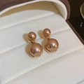 Elegant champagne gold double pearl earrings with curved metal finish in a white velvet box - Infinity Circle Double Pearl Stud Earrings