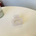 Detail view of pink square acrylic claw clip with high-quality metal spring and teeth - Jelly White