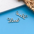 Silver metal alloy charms featuring Love and Smile cursive designs on blue background - Love Letter Double Hole Link 7x20mm