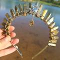 Detail of gold crystal tiara featuring sun pendant and wire-wrapped quartz stones - Gold/Sun/Gold Pendant