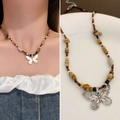 Beaded butterfly necklace with brown and beige stones on a dual-view product layout - Coffee Beaded Butterfly Pendant Style