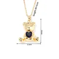 Detail view of gold bear pendant with blue heart crystal and precise size measurements - Gold Bear - Blue Heart Gem