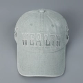 Close-up of vintage washed canvas baseball cap with detailed WEALTH embroidery - L (58-61cm) / Light Green