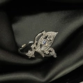 Macro shot of silver butterfly ring with cubic zirconia stones on black silk fabric - Adjustable Open / Silver Zirconia Butterfly