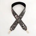Close-up of thick floral embroidered bag strap with gold metal lobster clasps on white background - Silver Clasp / Floral Green