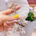 Portachiavi a forma di Bulldog Francese con strass bianchi e marroni e finitura oro - Caffè Misto