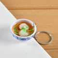 Miniature blue and white porcelain bowl keychain with wonton noodles and silver ring - Squid Noodle