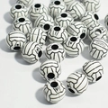 Detailed view of white acrylic soccer ball beads with central hole for jewelry making - 12mm Volleyball White Background Black Line