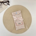 Floral fabric eyewear pouch detail with blue snap button and ribbon bow accent - Light Pink