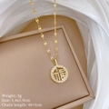 Collana in acciaio al titanio dorato con carattere Fu e cristalli lucenti in confezione - Pendente Rotondo Carattere Fu Oro(H525)