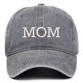 Close-up of white MOM embroidery on washed dark gray cotton baseball cap with fabric texture - MOM Embroidery / Gray