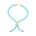 Sky blue braided rope bracelet with tree motif gold slider and adjustable cord ends - Bracelet: 21