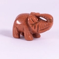 Miniature 1.5 inch elephant figurine carved from glittering reddish brown goldstone crystal - Gold Sandstone