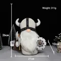 Handcrafted Viking warrior gnome with horned helmet, shield, and axe in cream color - White