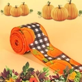 Close-up of wired edge burlap ribbon with pumpkin patterns and black white plaid textures - Black & White Plaid Pumpkin