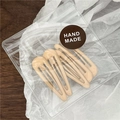 Set of 6 beige teardrop drip oil hair clips packaged in a clear handmade gift bag - 5 Pieces / Apricot